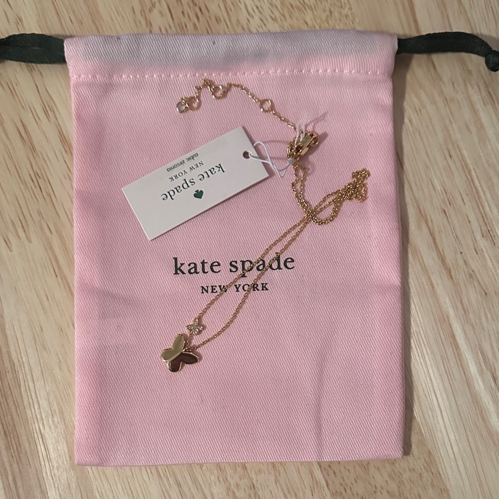 kate spade gold butterfly necklace with pink pouch